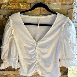 Anthropologie 100% cotton blouse, size medium, short sleeved.